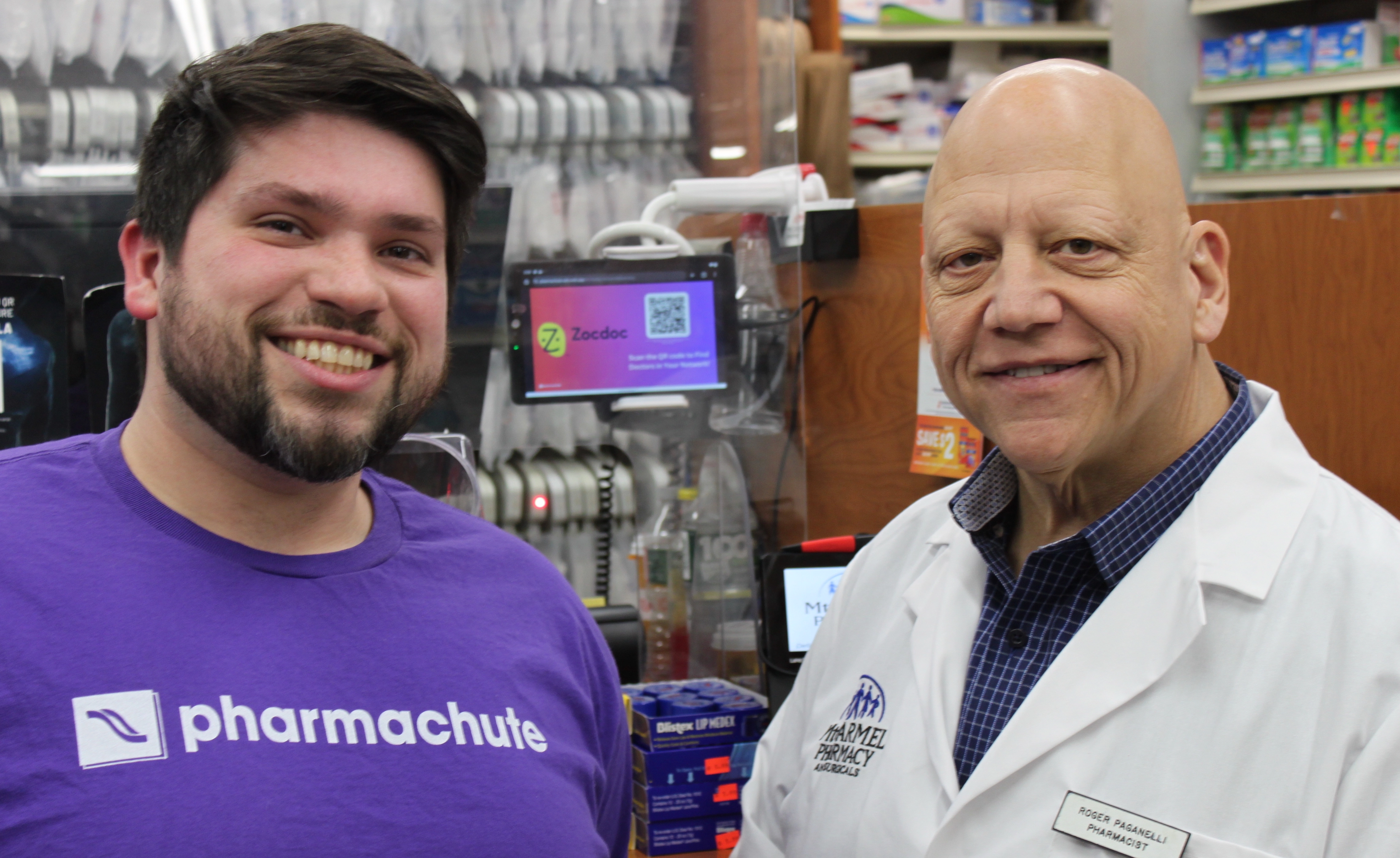 Pharmacy interior with staff